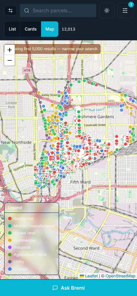 bremi on a phone: the map view, parcels coloured by property class with a legend